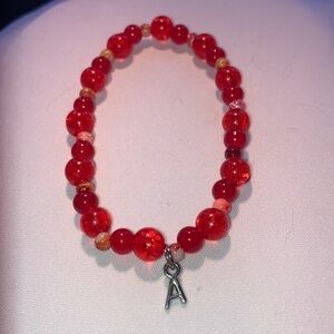 Red Glass Beaded Bracelet with A Charm